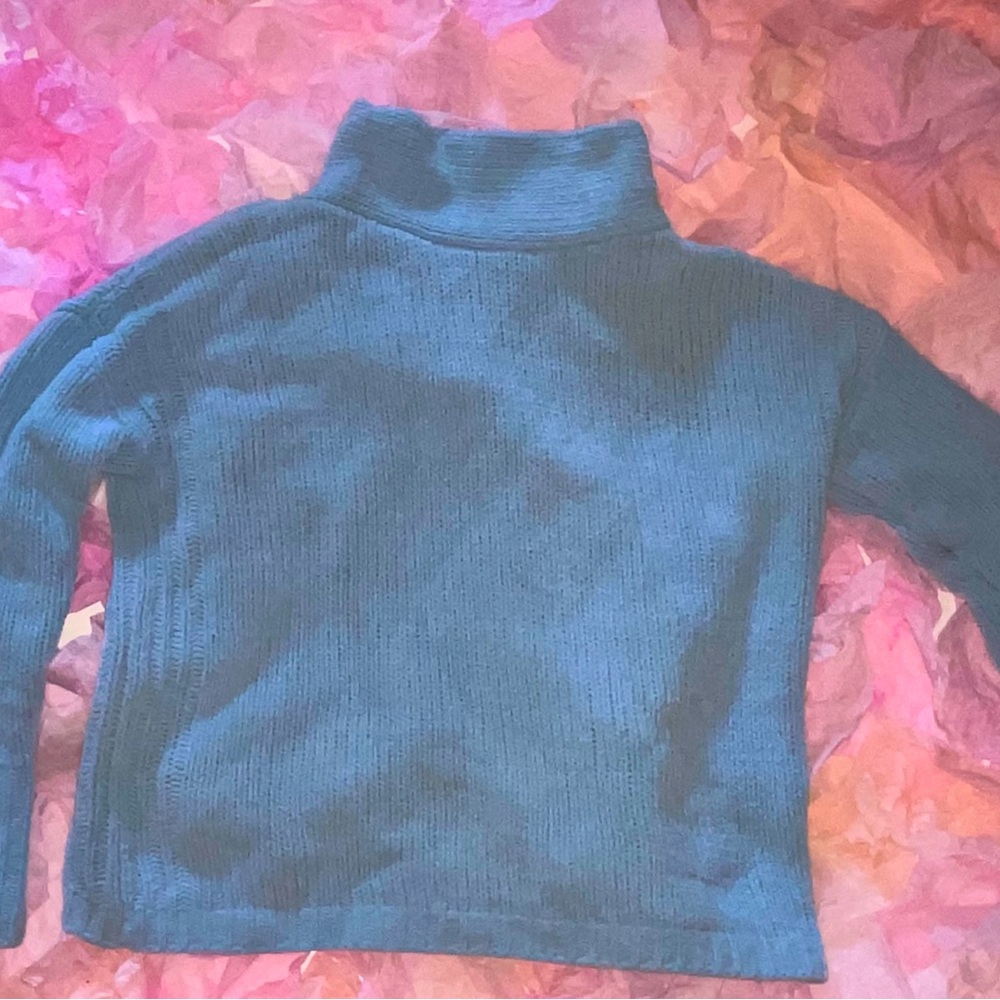Philosophy soft woven large knit sky blue sweater with high neck.